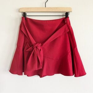 Zara • red tie front ruffle hem mini skirt